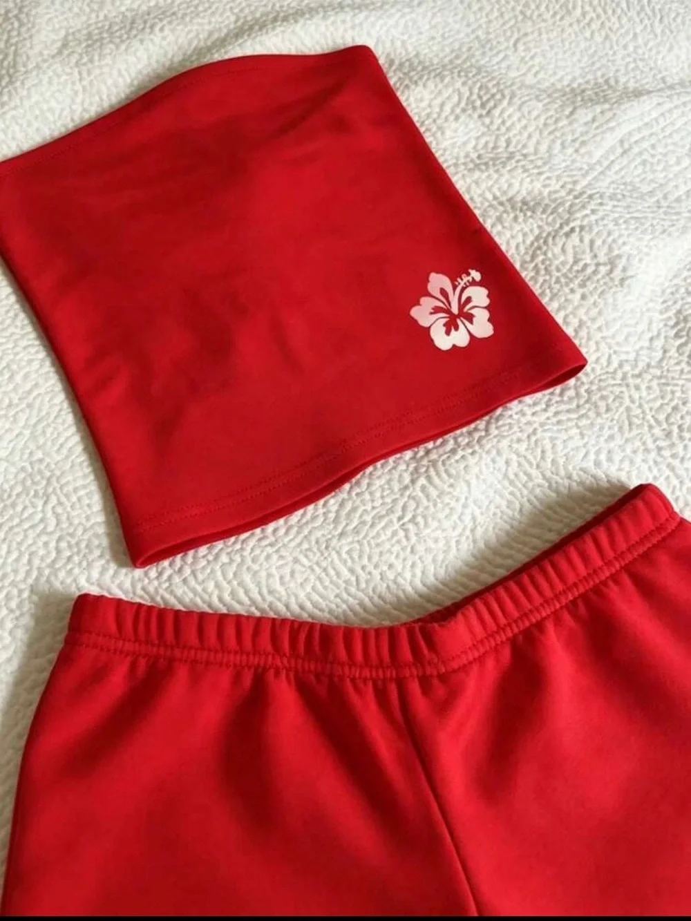 SHEIN Red Athletic Shorts with White Hibiscus Accent
